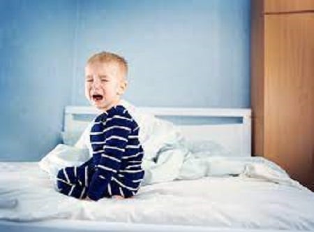 Toddler Crying on Bed